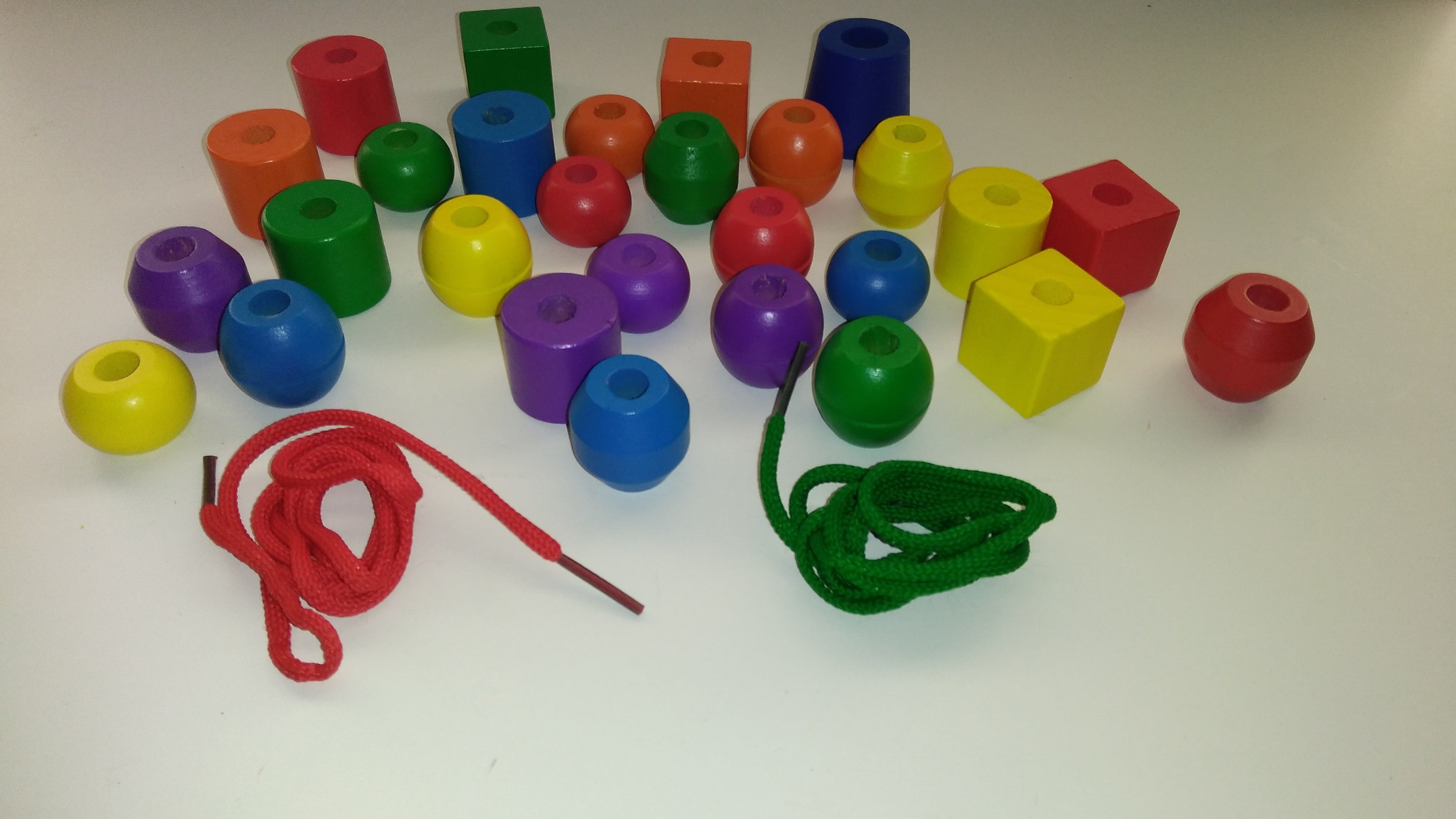 String Along Wooden Threading Blocks By Color or Shape We Got